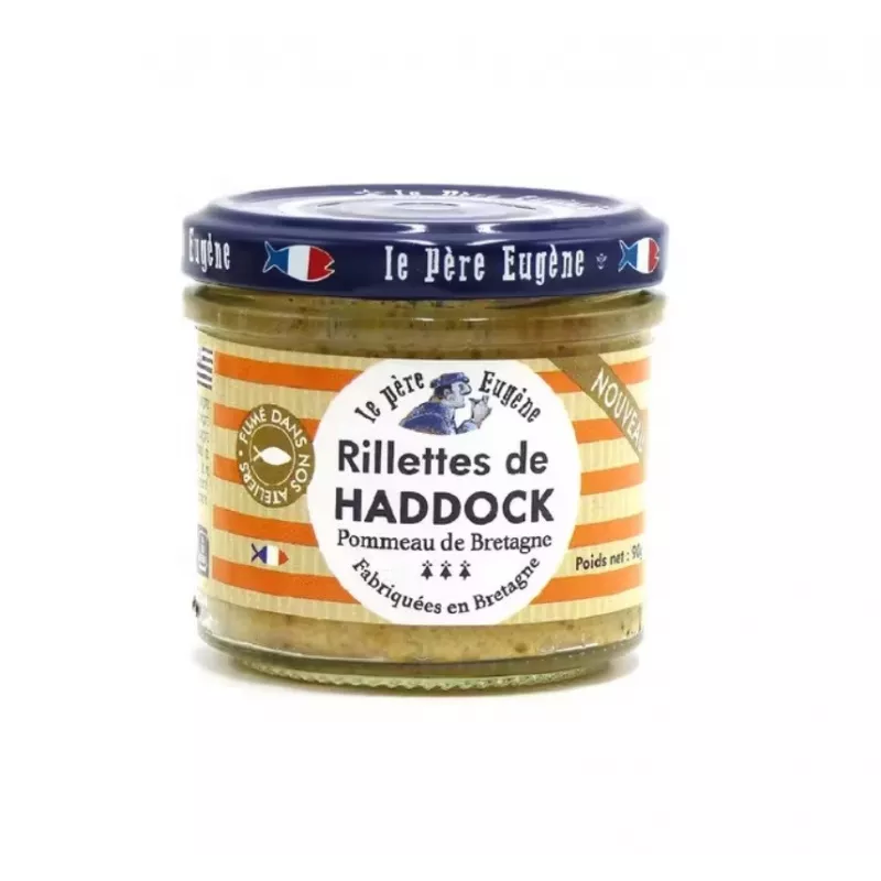 Rillettes de haddock au pommeau de Bretagne étalées sur un toast croustillant, garnies de ciboulette fraîche. Rillettes de haddock au pommeau de Bretagne étalées sur un toast croustillant, garnies de ciboulette fraîche.