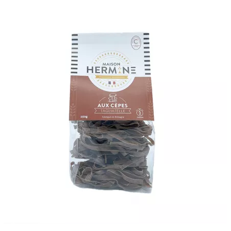Tagliatelles aux cèpes 250g en gros plan avec un fond rustique.