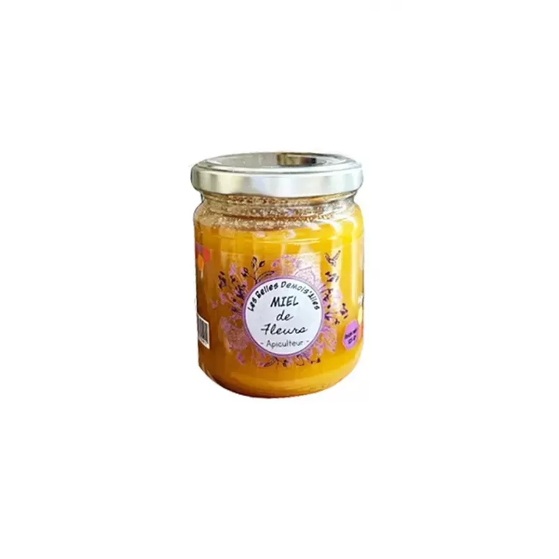 Tartine de pain frais garnie de Miel de Fleurs, illustrant une délicieuse façon de savourer ce produit artisanal