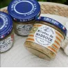 Pot de rillettes de haddock au pommeau de Bretagne, étiquette visible, sur fond neutre.